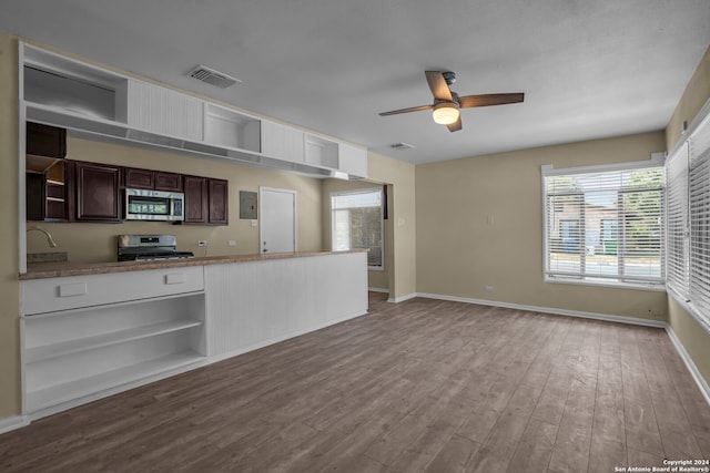 kitchen featuring appliances with stainless steel finishes, light hardwood / wood-style flooring, dark brown cabinets, and ceiling fan