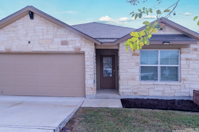 view of front of home featuring a garage