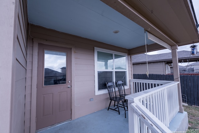 doorway to property featuring a patio area