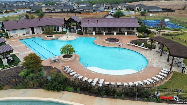 view of pool featuring a patio