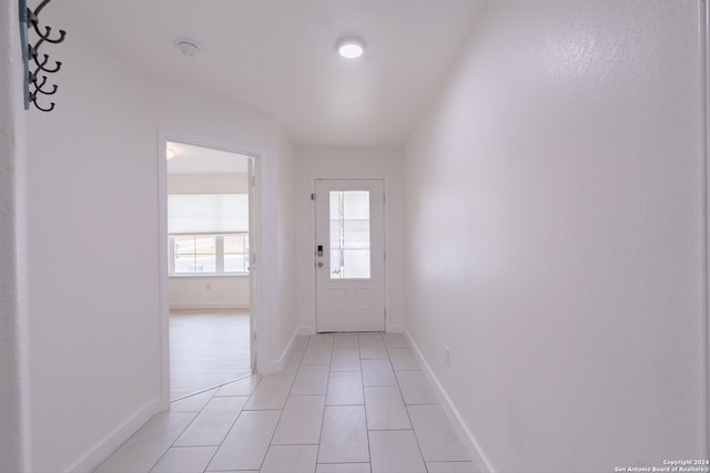 entryway featuring light tile patterned flooring