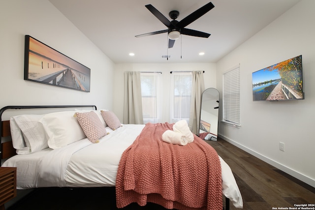 bedroom featuring dark hardwood / wood-style floors and ceiling fan