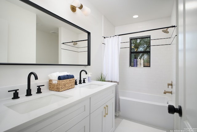 bathroom featuring vanity and shower / tub combo