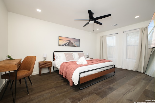 bedroom with dark wood-type flooring and ceiling fan