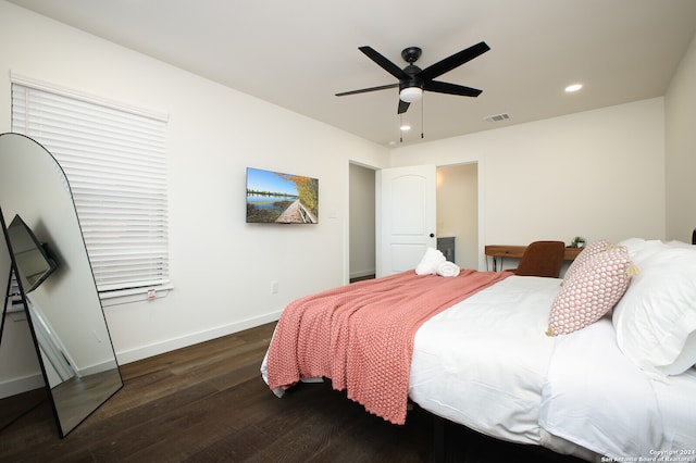 bedroom with ceiling fan and dark hardwood / wood-style floors