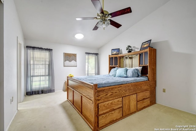 12331 Constitution St, San Antonio, TX 78233 - bedroom featuring light colored carpet, lofted ceiling, and a ceiling fan