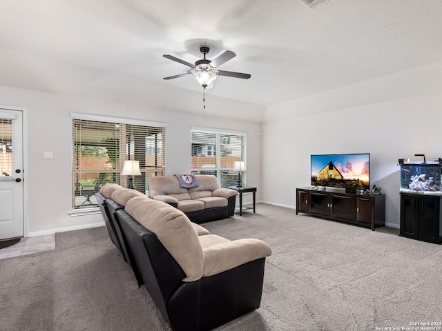 living room featuring light colored carpet and ceiling fan