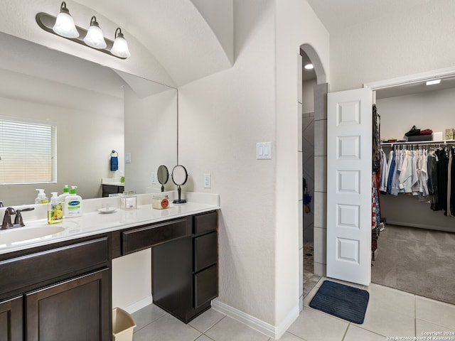 bathroom with vanity and tile patterned flooring