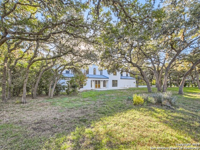 view of front of home with a front yard