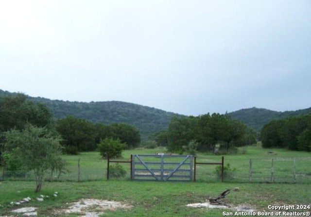 mountain view featuring a rural view