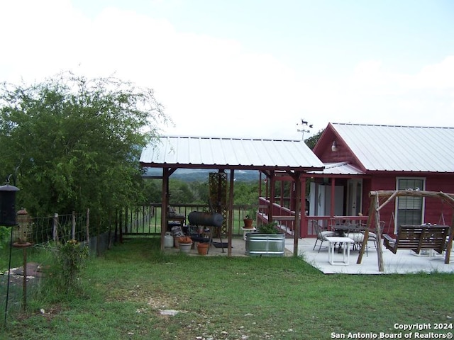 exterior space with a gazebo and a patio