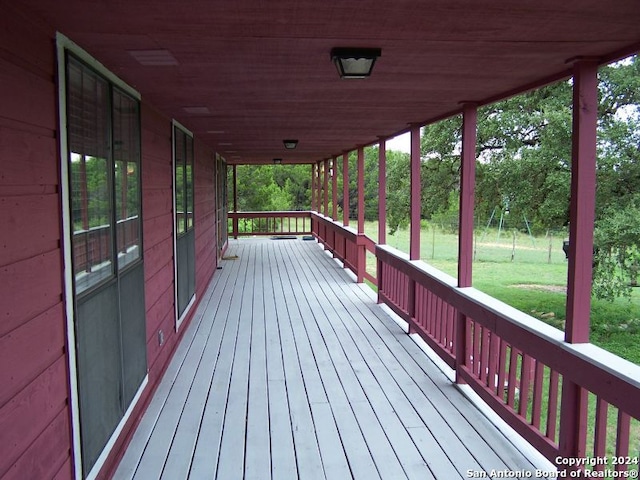 deck featuring a yard