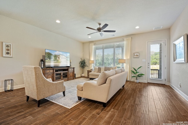 28964 Windlesham Way, San Antonio, TX 78260 - living area featuring ceiling fan, visible vents, baseboards, and dark wood-type flooring