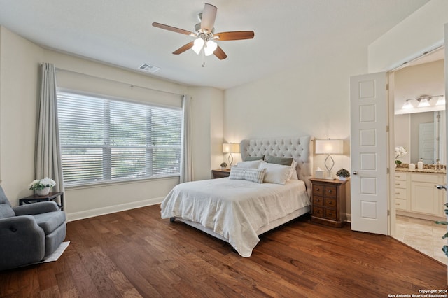 28964 Windlesham Way, San Antonio, TX 78260 - bedroom featuring ceiling fan, dark wood-style flooring, visible vents, baseboards, and connected bathroom