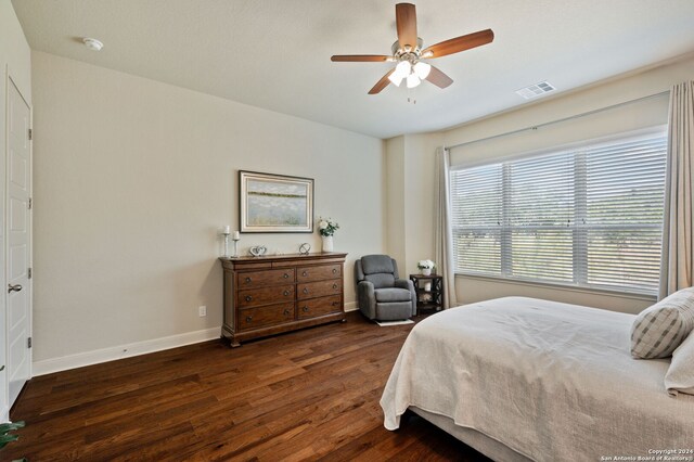 28964 Windlesham Way, San Antonio, TX 78260 - bedroom featuring visible vents, baseboards, ceiling fan, and wood finished floors