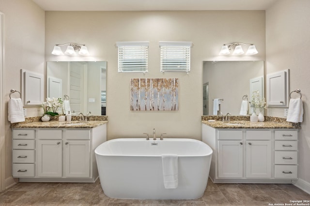 28964 Windlesham Way, San Antonio, TX 78260 - full bathroom featuring a sink, two vanities, and a soaking tub