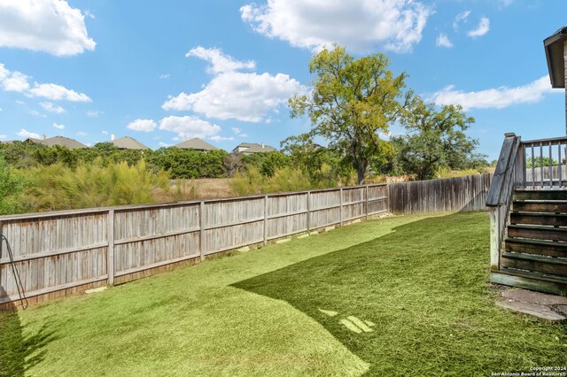 28964 Windlesham Way, San Antonio, TX 78260 - view of yard featuring a fenced backyard and stairway