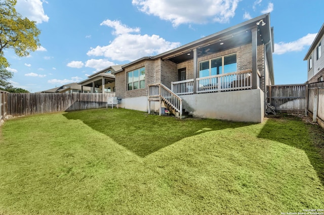 28964 Windlesham Way, San Antonio, TX 78260 - rear view of property featuring brick siding, a fenced backyard, and a yard