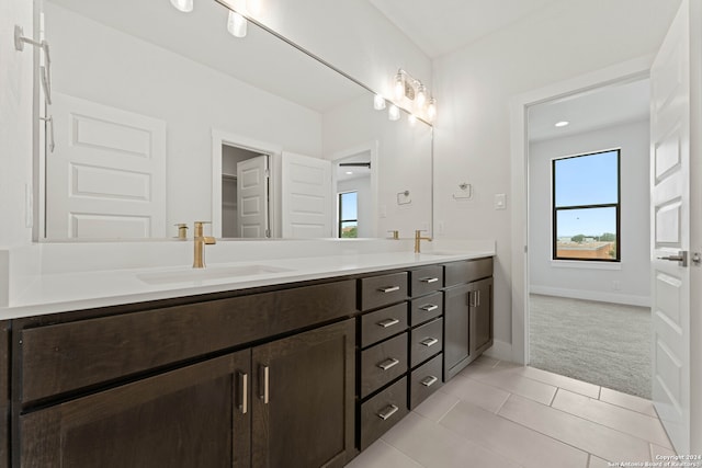 bathroom with vanity and tile patterned floors