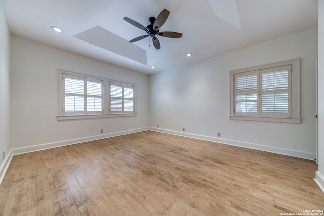 empty room featuring light hardwood / wood-style flooring and ceiling fan