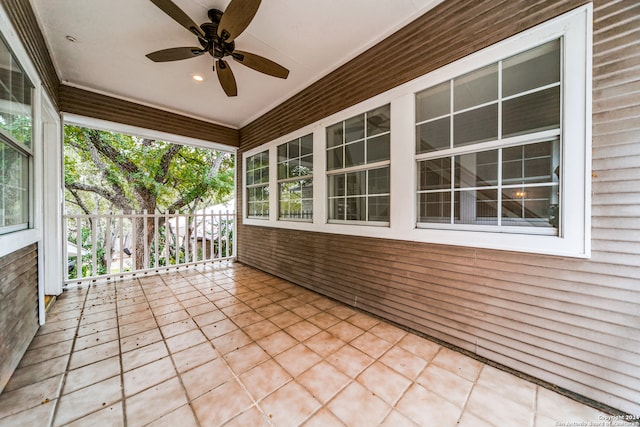 view of patio featuring ceiling fan