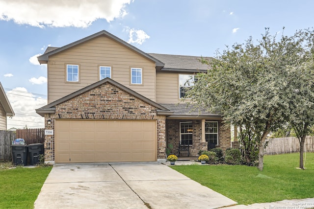 view of front facade with a front lawn and a garage