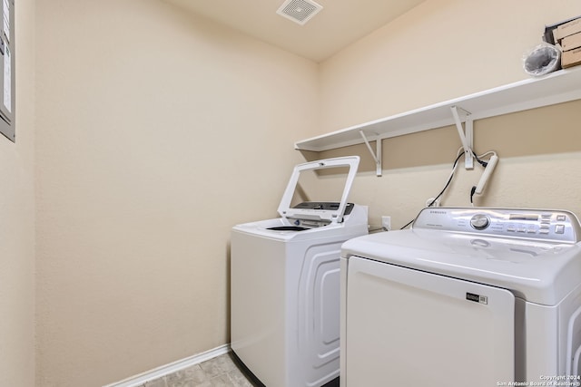 laundry area with washer and dryer