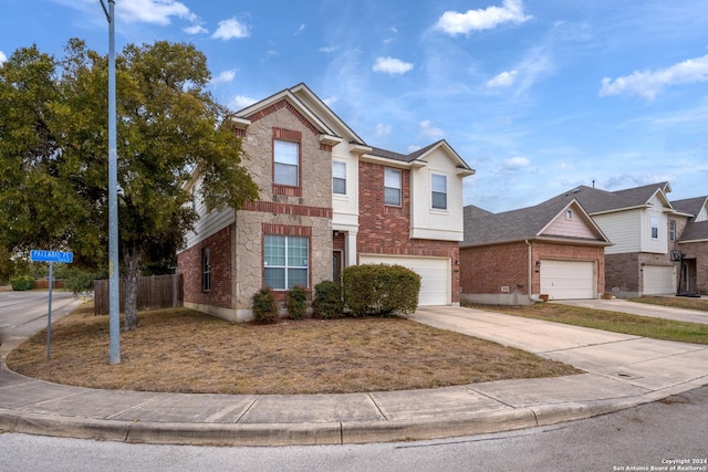 931 Palladio Pl, San Antonio, TX 78253 - view of front of home with driveway, fence, brick siding, and a garage