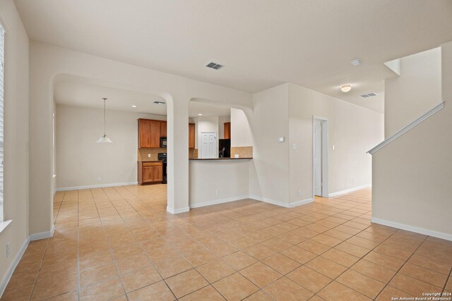 931 Palladio Pl, San Antonio, TX 78253 - unfurnished living room featuring light tile patterned floors, baseboards, and recessed lighting