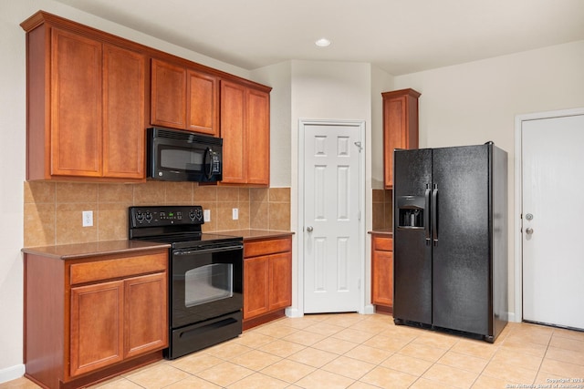 931 Palladio Pl, San Antonio, TX 78253 - kitchen with black appliances, tasteful backsplash, brown cabinetry, light tile patterned flooring, and recessed lighting