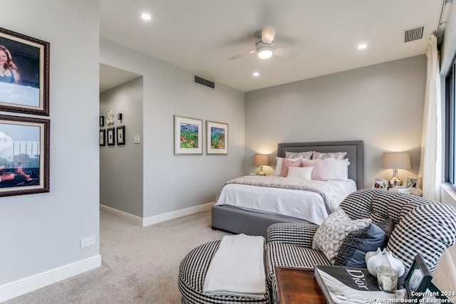 bedroom featuring ceiling fan and light colored carpet