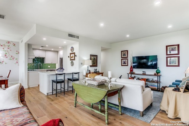 living room featuring light hardwood / wood-style flooring