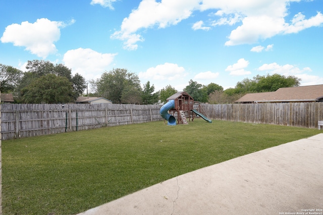 view of yard featuring a playground