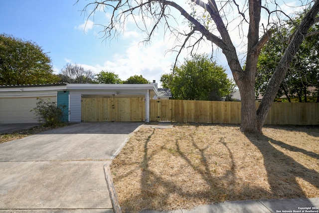 garage with a carport