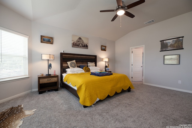 bedroom featuring ceiling fan, carpet, and lofted ceiling