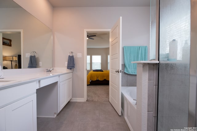 bathroom featuring vanity, tile patterned flooring, a bath, and ceiling fan