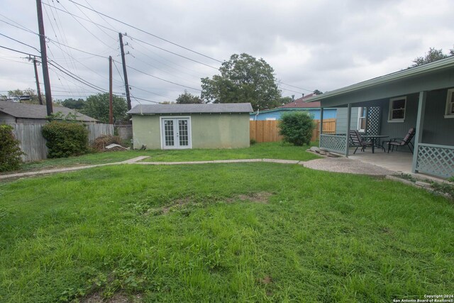 2407 W Mistletoe Ave, San Antonio, TX 78228 - view of yard featuring french doors and a patio