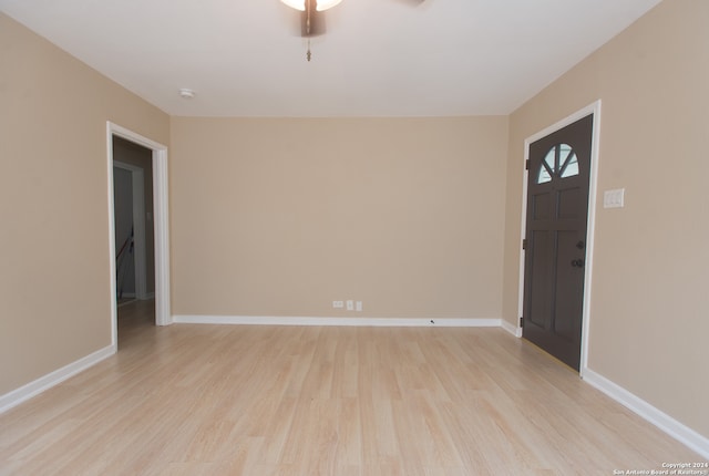 interior space featuring light wood-type flooring and ceiling fan