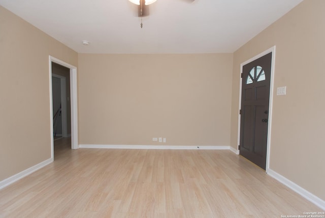 2407 W Mistletoe Ave, San Antonio, TX 78228 - foyer with light wood-style floors, baseboards, and a ceiling fan