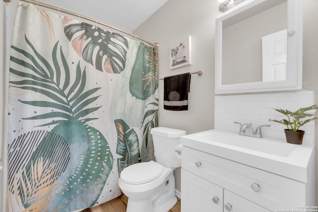 8722 Ridge Moon Dr, San Antonio, TX 78239 - bathroom featuring vanity, backsplash, toilet, wood finished floors, and curtained shower