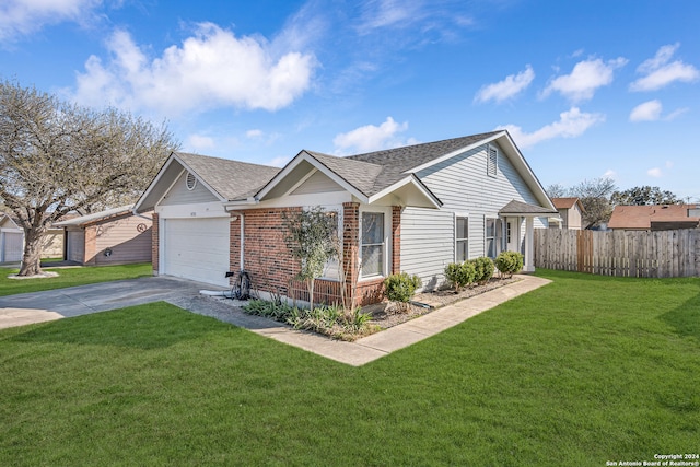 ranch-style house featuring a front lawn and a garage