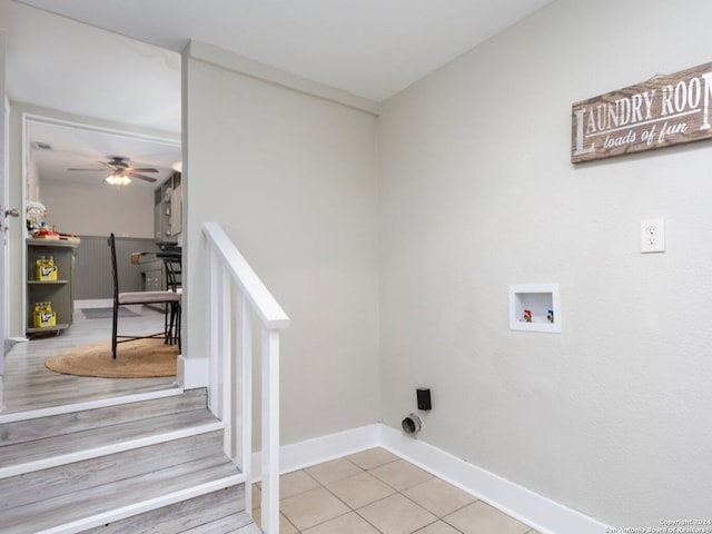 clothes washing area with hookup for a washing machine, wood-type flooring, and ceiling fan