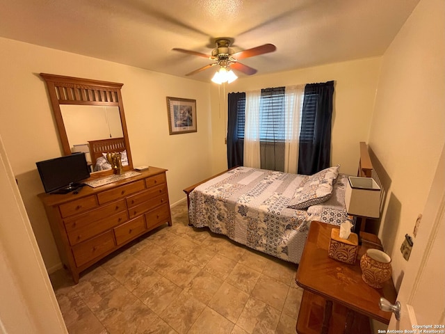 bedroom featuring ceiling fan