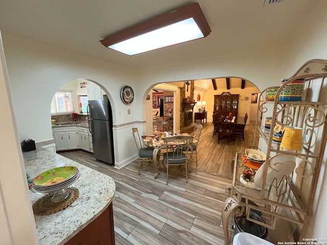 interior space featuring light hardwood / wood-style floors and sink