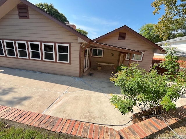 view of front facade with a patio area