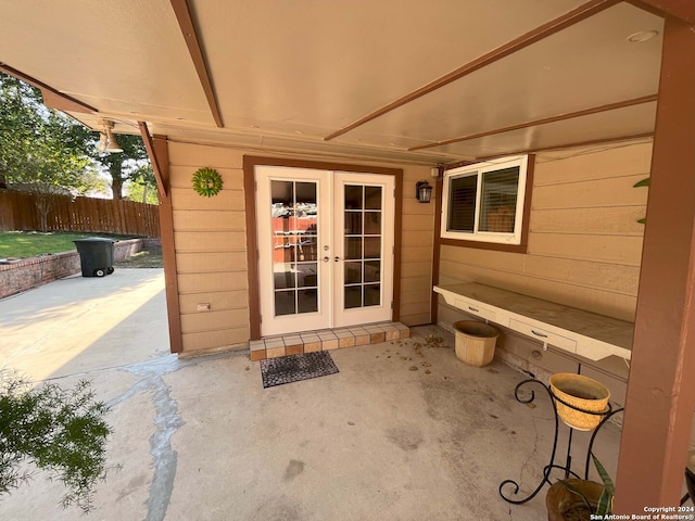 doorway to property with a patio area and french doors