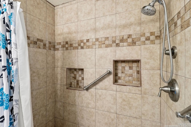 room details with a tile shower