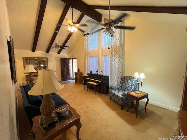 carpeted living room featuring beam ceiling and high vaulted ceiling