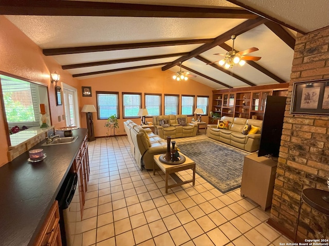 living room with sink, a textured ceiling, light tile patterned flooring, and vaulted ceiling with beams