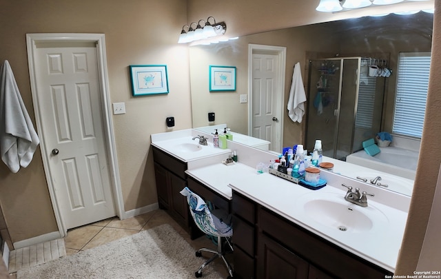 bathroom featuring vanity, plus walk in shower, and tile patterned floors